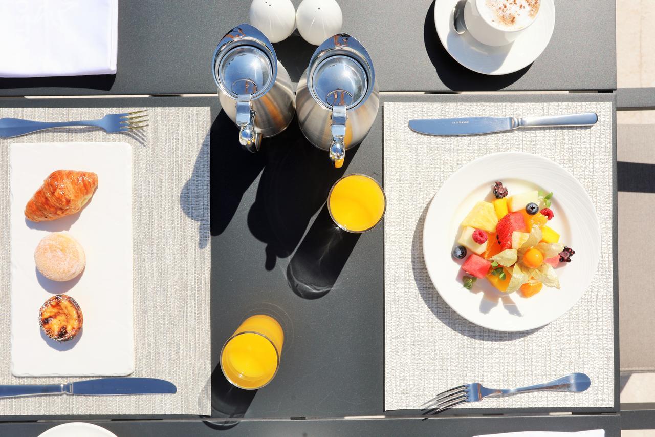 Iberostar Selection Lisboa Otel Dış mekan fotoğraf A place setting